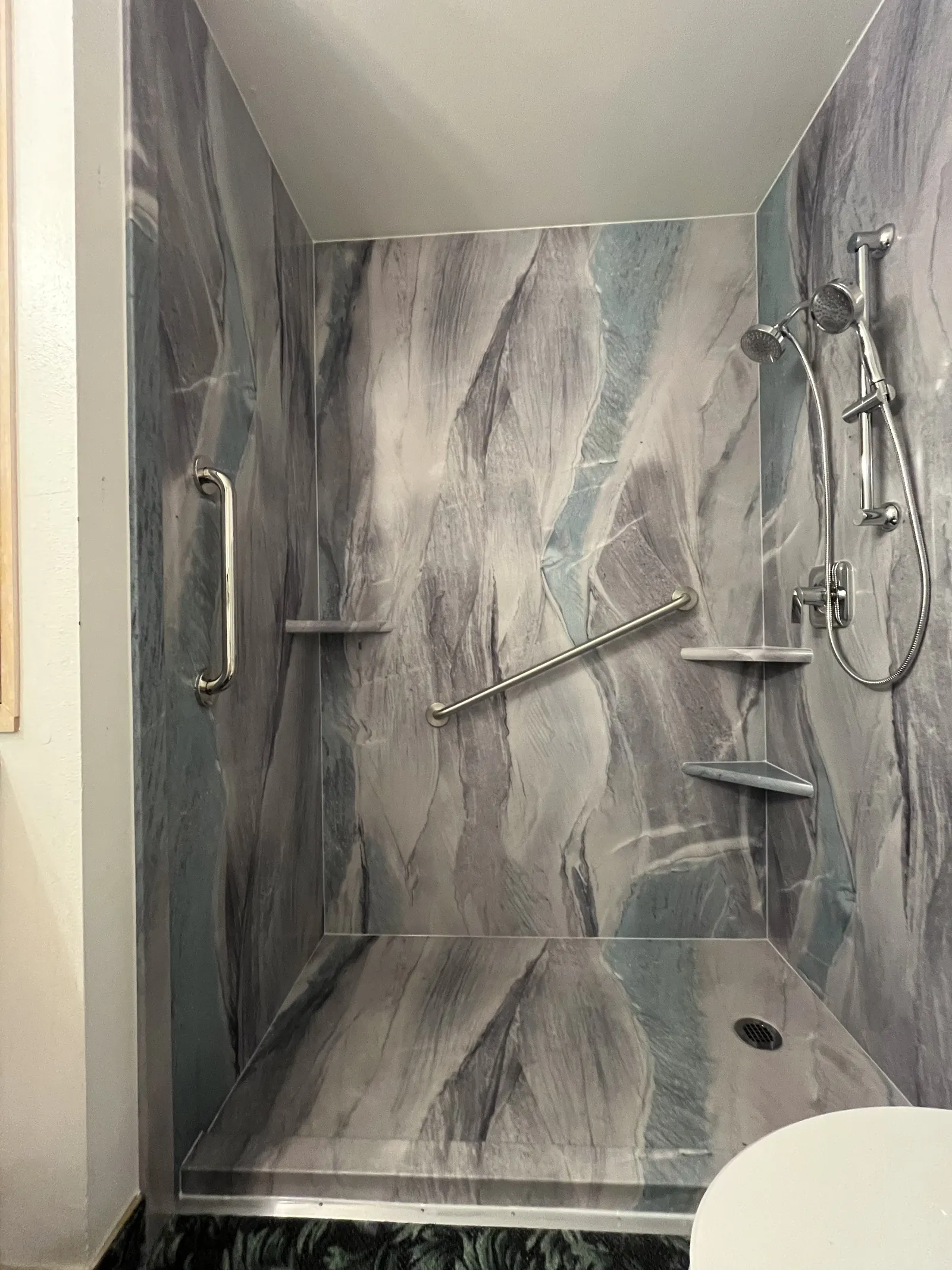 After: walk-in shower with grab bar